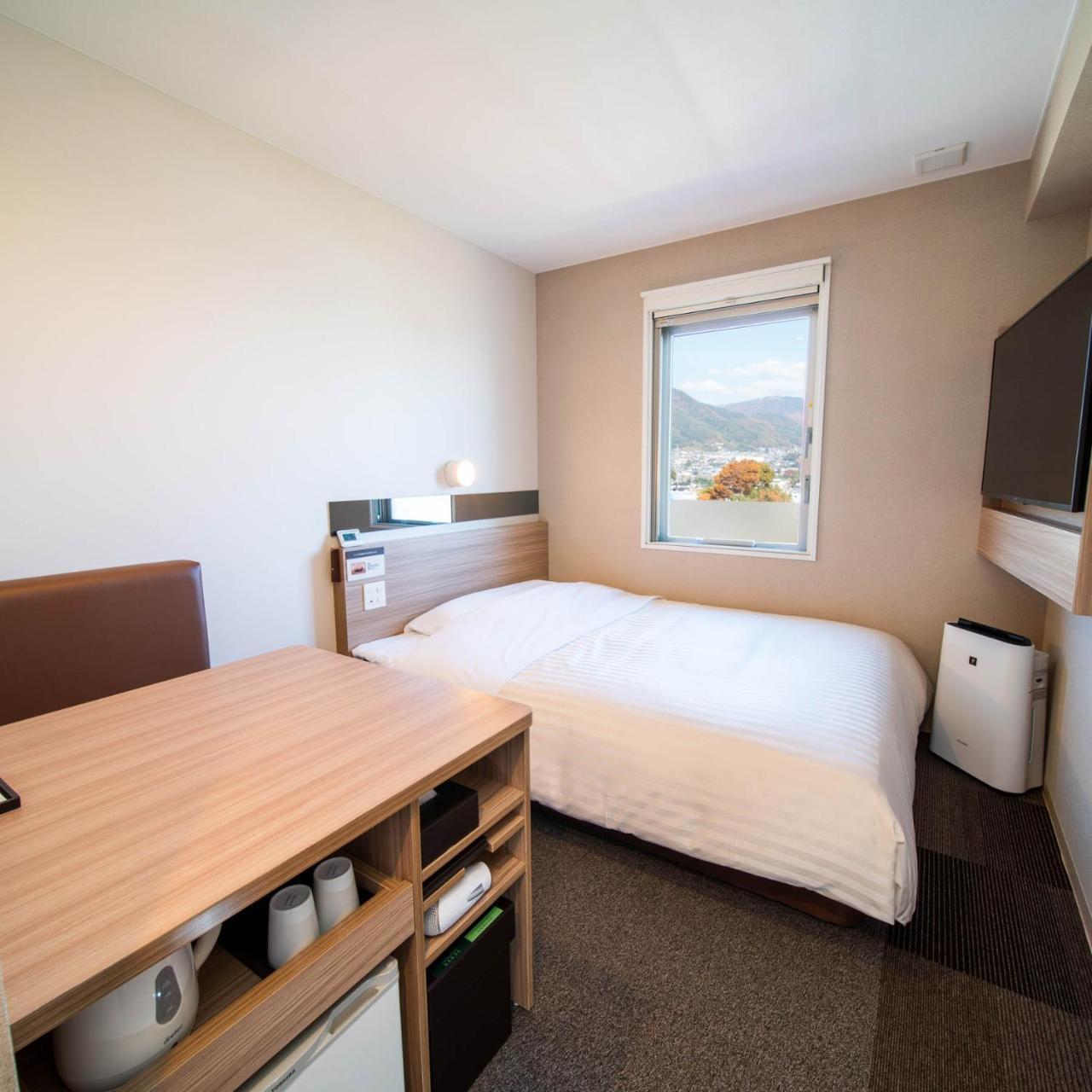 Super Hotel Nagano Iida Inter Buitenkant foto